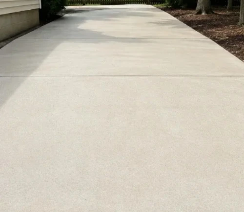 Clean concrete driveway after pressure washing in Palm Coast, FL