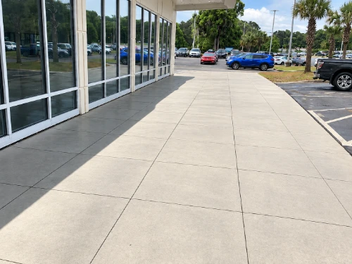 Clean storefront exterior after commercial pressure washing in Palm Coast, FL